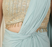 Load image into Gallery viewer, Light Gold and blue halter cut style blouse with draped Saree